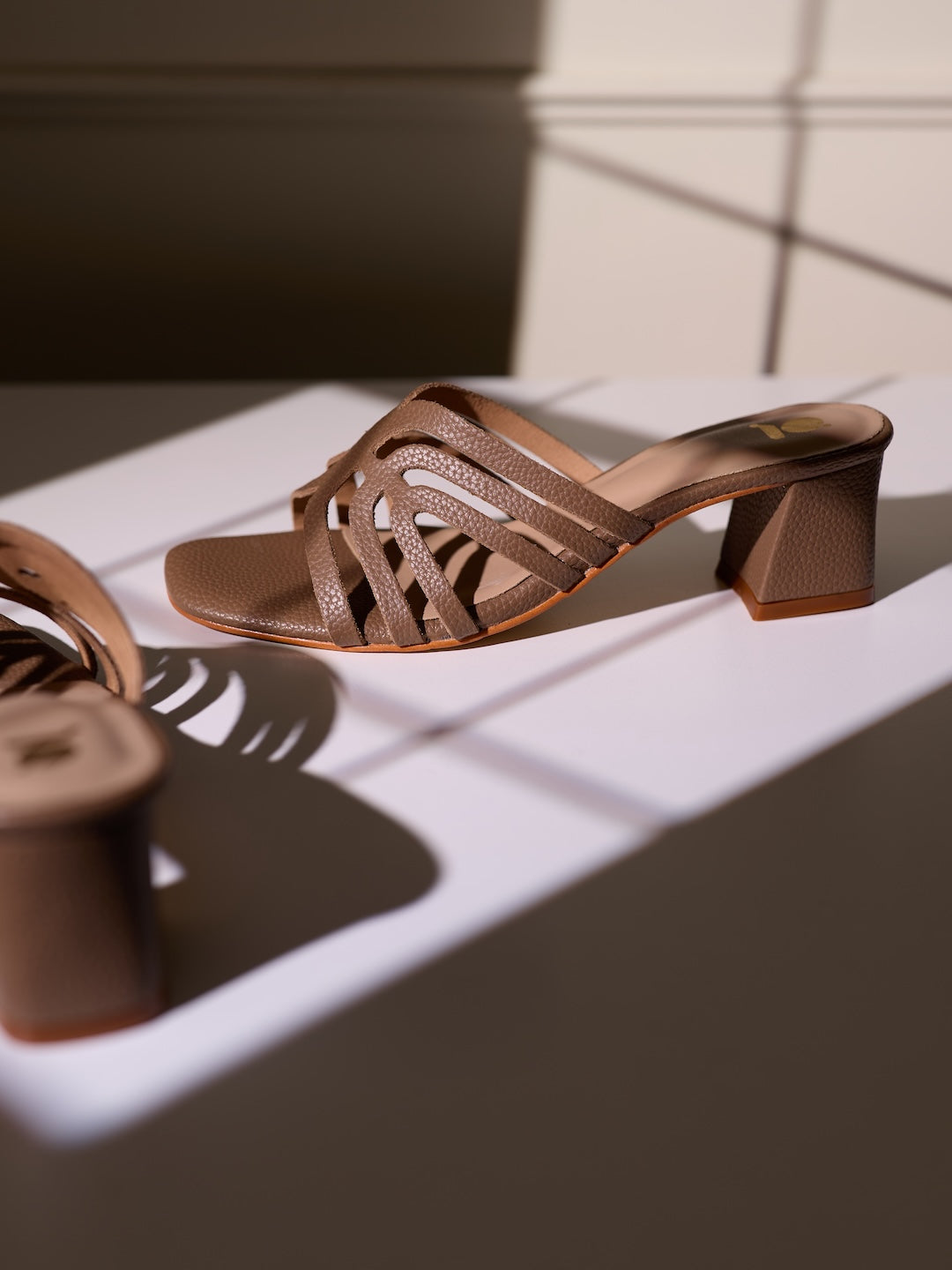 SLIT DECISION HEELS