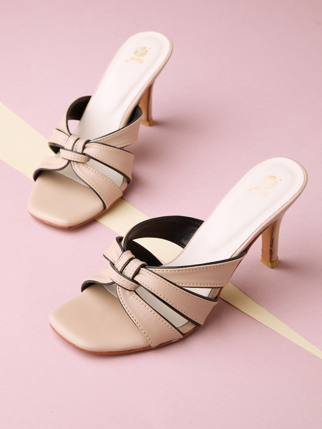 SYMMETRICAL PIPING HEELS